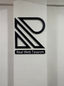 Real Web Tasarım logo